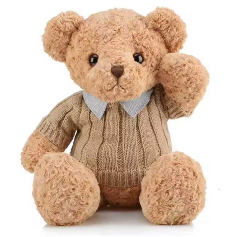 Ourson en peluche habillé – Cadeau tendre et intemporel